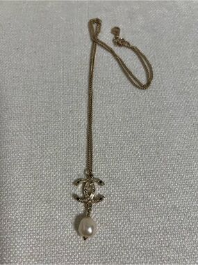 CHANEL Gold CC Logo Necklace with Pearl Drop